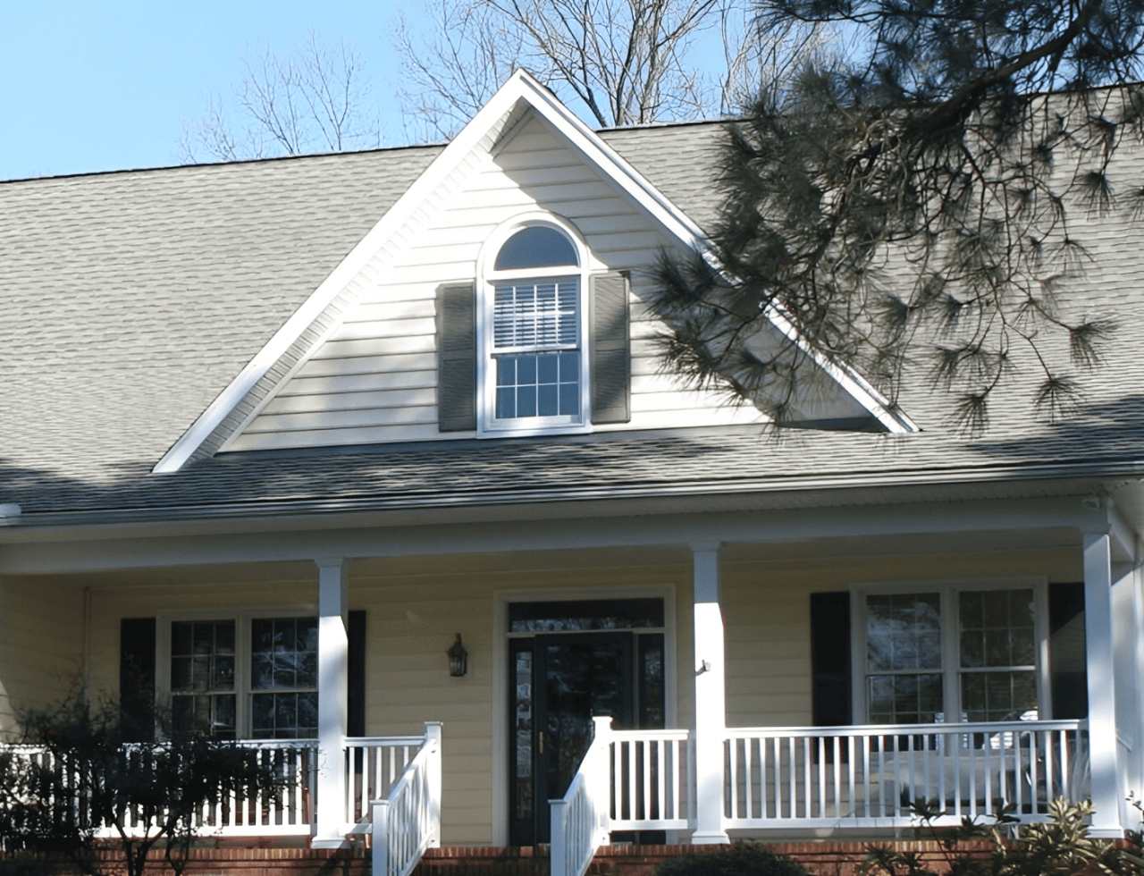 Modern home exterior with white railings