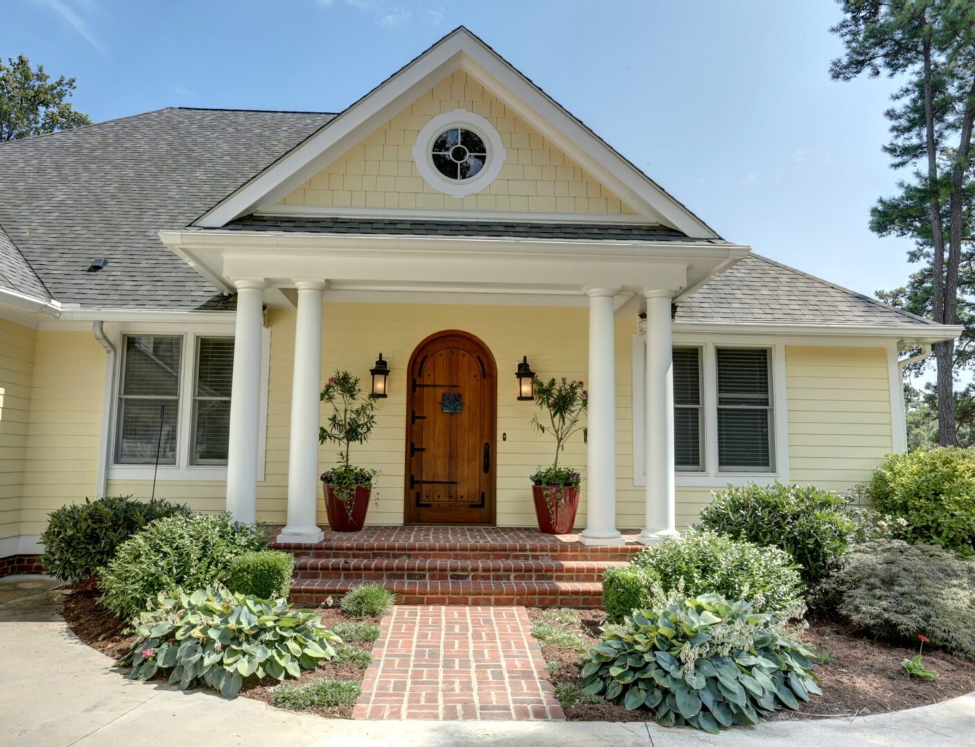 Cozy suburban house with manicured garden